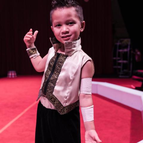 a person standing posing for the camera