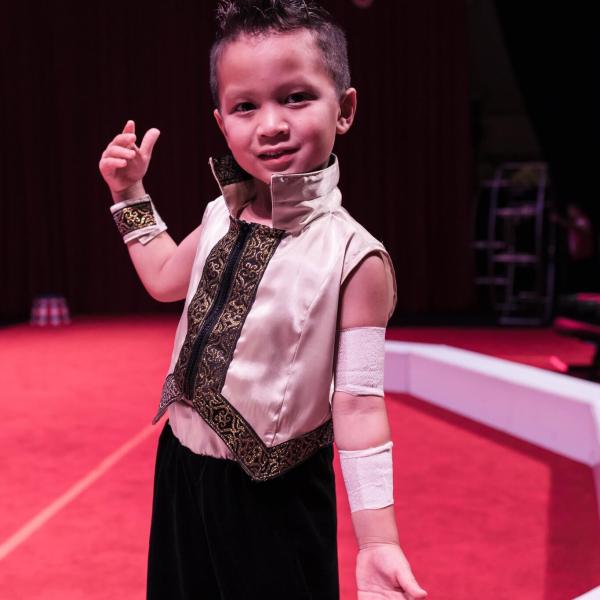 a person standing posing for the camera