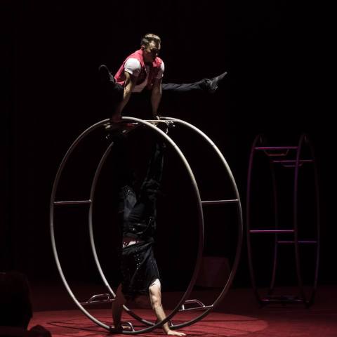 a person sitting in a dark room