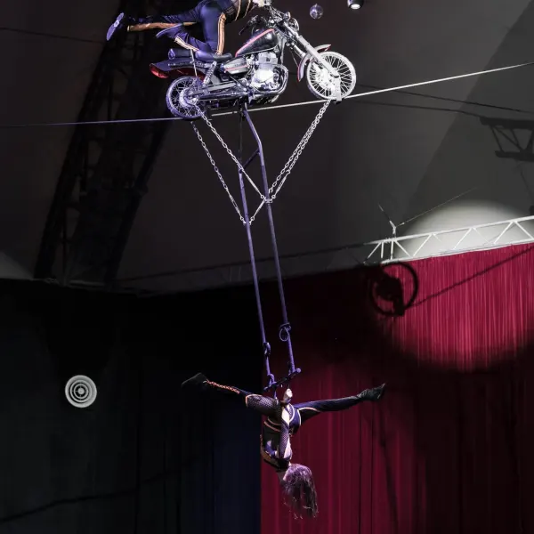 a person hanging on a stage