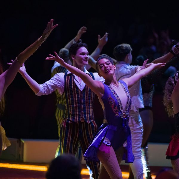 a group of people standing on a stage