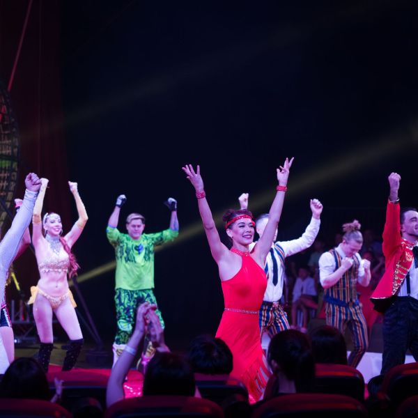 Jamie Moore et al. on a stage